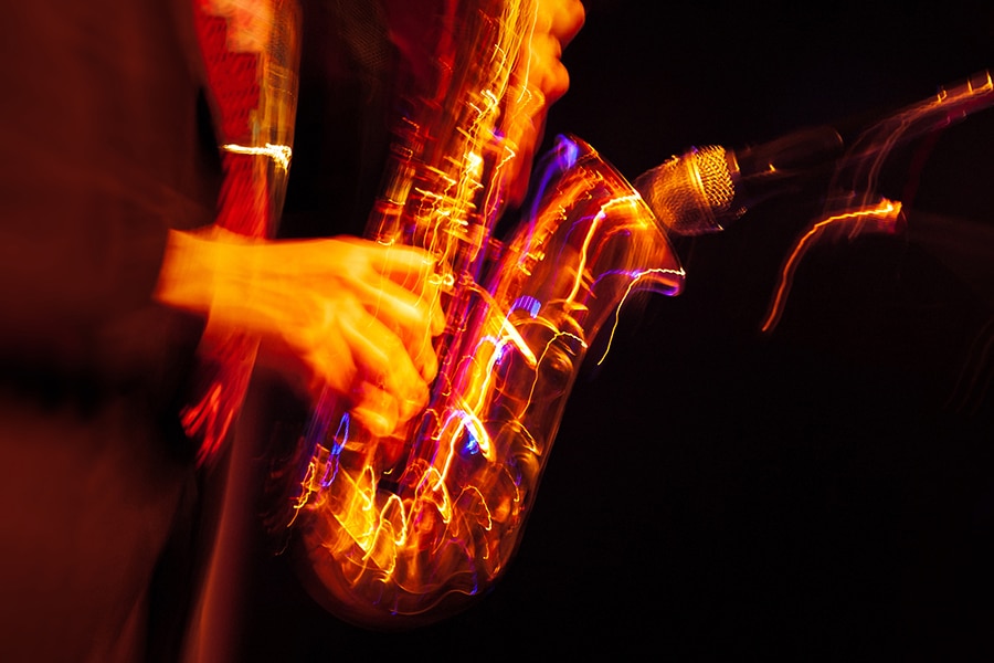 a saxophonist at Savannah Music Festival 2024